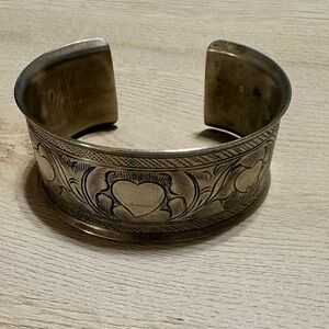 Silver tone cuff bracelet